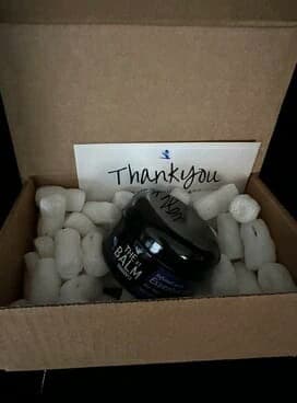  Woman about to drink a cup of mud water